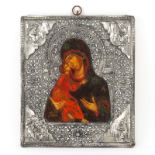 19th Century Russian Hand painted Wood Icon With Intricate Silver Plate Overlay Cover. Signed and