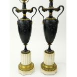 Pair Antique Louis XVI Style Bronze Urn Lamps. Patinated and gilt bronze on marble bases.