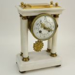 Tiffany and Co France Marble and Brass Mantle Clock. Porcelain dial marked "Tiffany & Co., France"