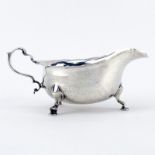 Tiffany & Co Sterling Silver Gravy Boat. Stamped Tiffany & Co Sterling number 1703 on underside.