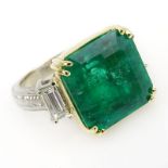 Beautiful Approx. 12.02 Carat Colombian Emerald, 1.10 carat Baguette Cut Diamond and 18 Karat Yellow