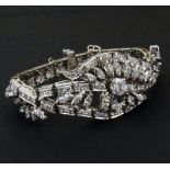 Circa 1950s Approx. 13.0 Carat Round Brilliant and Marquise Cut Diamond and Platinum Bracelet.