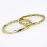 Vintage 14 Karat Yellow Gold Rope Style Hinged bangle Bracelet together with a Vintage Gold Bracelet