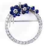 Circa 1950s 18 Karat White Gold Circle Brooch Set with Approx. .65 Carat Round Brilliant Cut