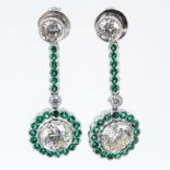 Fine Quality Approx. 3.63 Carat TW Diamond, 1.20 Carat Emerald and Platinum Pendant Earrings. Set at