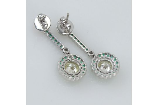 Fine Quality Approx. 3.63 Carat TW Diamond, 1.20 Carat Emerald and Platinum Pendant Earrings. Set at - Image 2 of 3