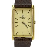 Men's Vintage Universal Geneve 18 Karat Yellow Gold Manual Movement Tank Watch with Lizard Strap.