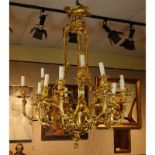 Late 19th Century French Empire Style 15-Arm Gilt Bronze Chandelier. Decorated with branch form arms