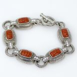 Judith Ripka Sterling Silver, CZ and Coral Bracelet. Signed. Good condition with box. Measures 7-3/