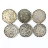 Lot of Six (6) 1880-1897 U.S. Morgan Silver Dollars. Mint mark "O" on 4 coins. Needs cleaning,