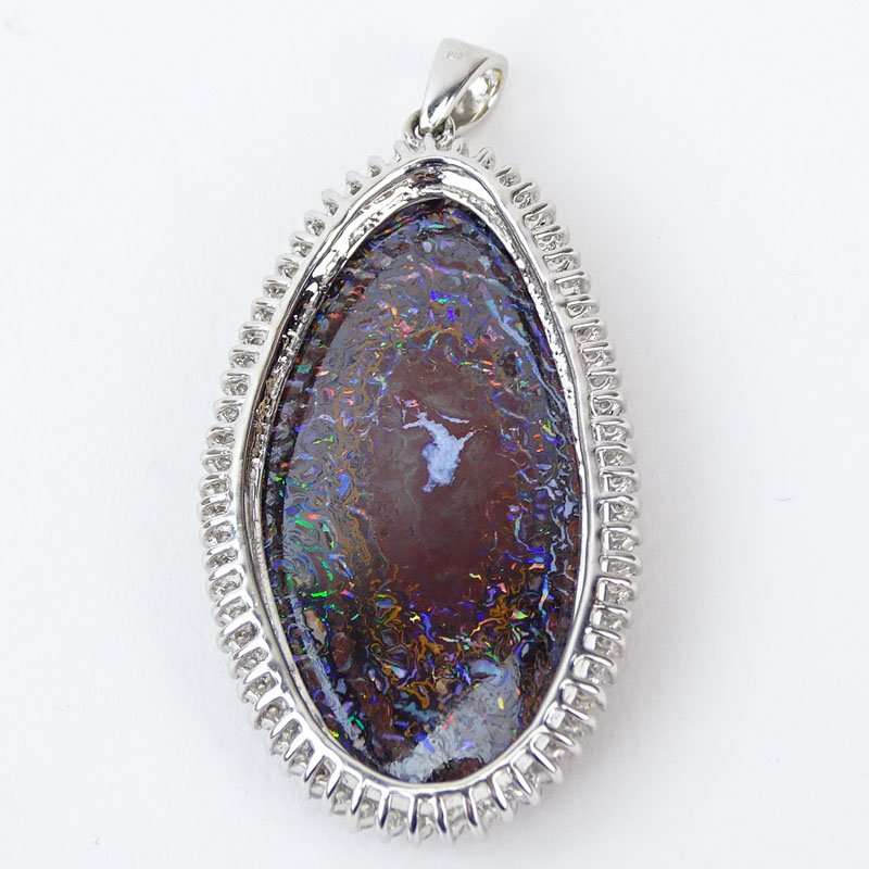 Large Black Opal and 18 Karat White Gold Pendant with Diamond Bezel. Opal measures 44mm x 24mm, good - Image 2 of 3