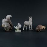 Group Of Four (4) Cybis Bisque Porcelain Animal Figurines. Includes: squirrel, donkey, buffalo and