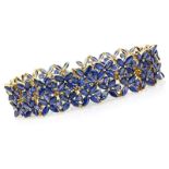 Round and Marquise Cut Sapphire and 14 Karat Yellow Gold Bracelet. Sapphires with good saturation of