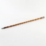 Antique Bamboo and Silver Walking Stick. The Silver handle with a basket weave motif. Unsigned.