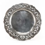 Peruvian Silver Plate Round Serving Tray. Raised fruit relief on border. Stamped "Plaque Peru" on