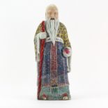 Later 20th Century Chinese Porcelain Immortal Figure. Holding staff and peach. Impressed mark on