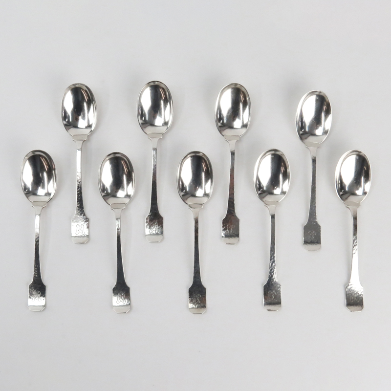 Nine (9) Antique Shreve & Co Hand Hammered Sterling Silver Teaspoons in the Norman Pattern.