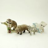 Group Of Four (4) Cybis Bisque Porcelain Animal Figurines. Includes: raccoon, black bear, cat,