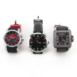 Three (3) Men's Invicta Watches. Includes: Model #0427 Stainless Steel and Leather Strap Watch, 49mm