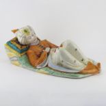 Large Antique Italian Majolica Faience Pottery Figure. Depicts a resting young boy dressed in