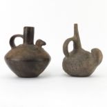 Two (2) Pre Columbian or Later Pottery Stirrup Vessels. Both depict a bird motif. Patina and natural