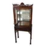 Mid Century Chinese Chippendale Style Mahogany Vitrine. Carved floral and shell crown top with