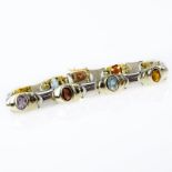 Vintage 14 Karat Yellow and White Gold Link Bracelet Set with Oval Cut Multi Gemstones. Stamped 14K.