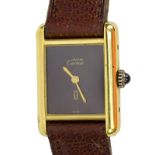 1977 Must de Cartier Women's 18k Gold Plated Tortoise Tank Wristwatch With Leather Strap. Signed