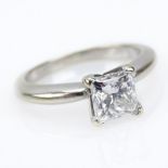 GIA Certified .91 Carat Princess Cut Diamond and 14 Karat White Gold Engagement Ring. Diamond E