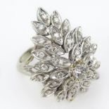 Lady's Vintage Round Brilliant Cut Diamond and 14 Karat White Gold Cluster Ring.