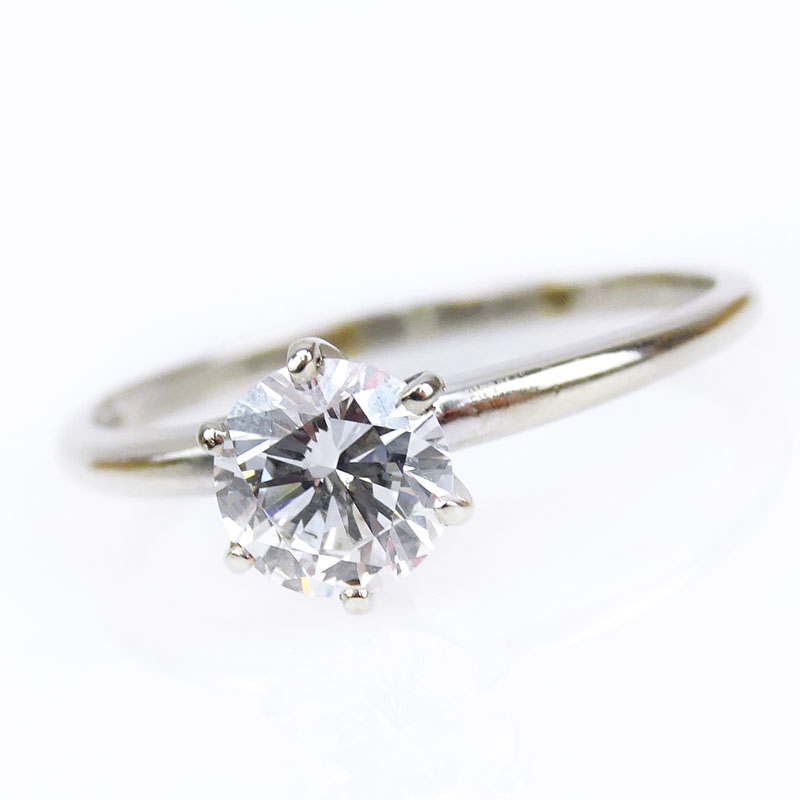 Vintage Approx. 1.0 Carat Round Brilliant Cut Diamond and 14 Karat White Gold Engagement Ring.