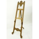 Antique Carved Wood Easel. Unsigned. Wear rubbing and a gouge on front leg. Measures 69-1/2" H x 25"