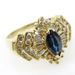 Lady's Marquise Cut Sapphire, Diamond and 14 Karat Yellow Gold Cluster Ring. Stamped 14K. Good