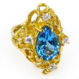 Lady's Vintage Pear Shape London Blue Topaz, Round Brilliant Cut Diamond and 14 Karat Yellow Gold