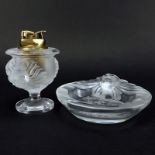 Two (2) Piece Lalique "Tete De Lion" Crystal Smoking Set. Includes lighter and ashtray. Signed. Good