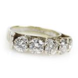 Vintage Approx. 2.2 Carat TW Round Brilliant Cut Diamond and 18 Karat White Gold Five Stone Ring.