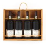 Four (4) Taylor Fladgate Port Wine Bottles on Wooden Case. Includes sealed 10 to 40 years matured in