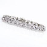 Approx. 8.50 Carat Baguette and Round Brilliant Cut Diamond and 18 Karat White Gold Bracelet.