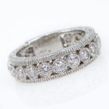 AIGL Certified 1.36 Carat TW Round Brilliant Cut Diamond and 14 Karat White Gold Eternity Band.