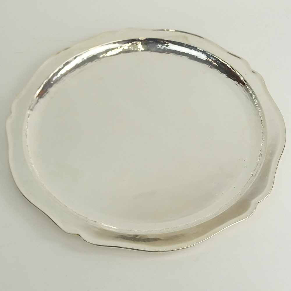 Silver Plate Round Tray. Unsigned. Light surface scratches or in good condition. Measures 15-1/2"