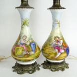 Pair of Vintage French Hand Painted Porcelain and Bronze Lamps. Unsigned. Good condition. Measures