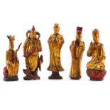 Grouping of Five (5) 19/20th Century Chinese Wood Carved Gilt Painted Figurines. Rubbing to wood,