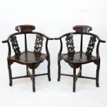 Pair of Antique Chinese Carved Rosewood Corner Chairs. Dragon openwork scroll carved back rest,