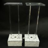 Pair of Modern Lucite and Lacquer Electrified Swivel Pedestals. Marbleized lacquer base with mounted