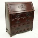 Mid Century Chinese Slant Top Desk. Carved bird relief to front of slant door and 4 drawers,