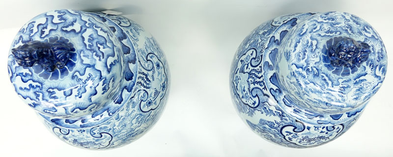 Large Pair of Matching Chinese Blue and White Porcelain Covered Urns. In a baluster form with foo - Image 2 of 3