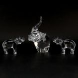 Three (3) Crystal Elephant Figurines. Includes: Steuben crystal trunk up figurine, and two