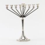 Modern Sterling Silver Menorah. Engraved on base. Signed 925 and makers mark. Measures 12" H x 11-