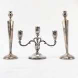 Pair of Sterling Silver Candle Sticks and A Weighted Silver 3 Arm Candelabra. The pair of