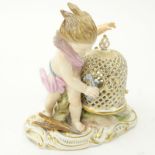 19th Century Meissen Porcelain Putti Catching Birds Figurine. Blue crossed swords mark on